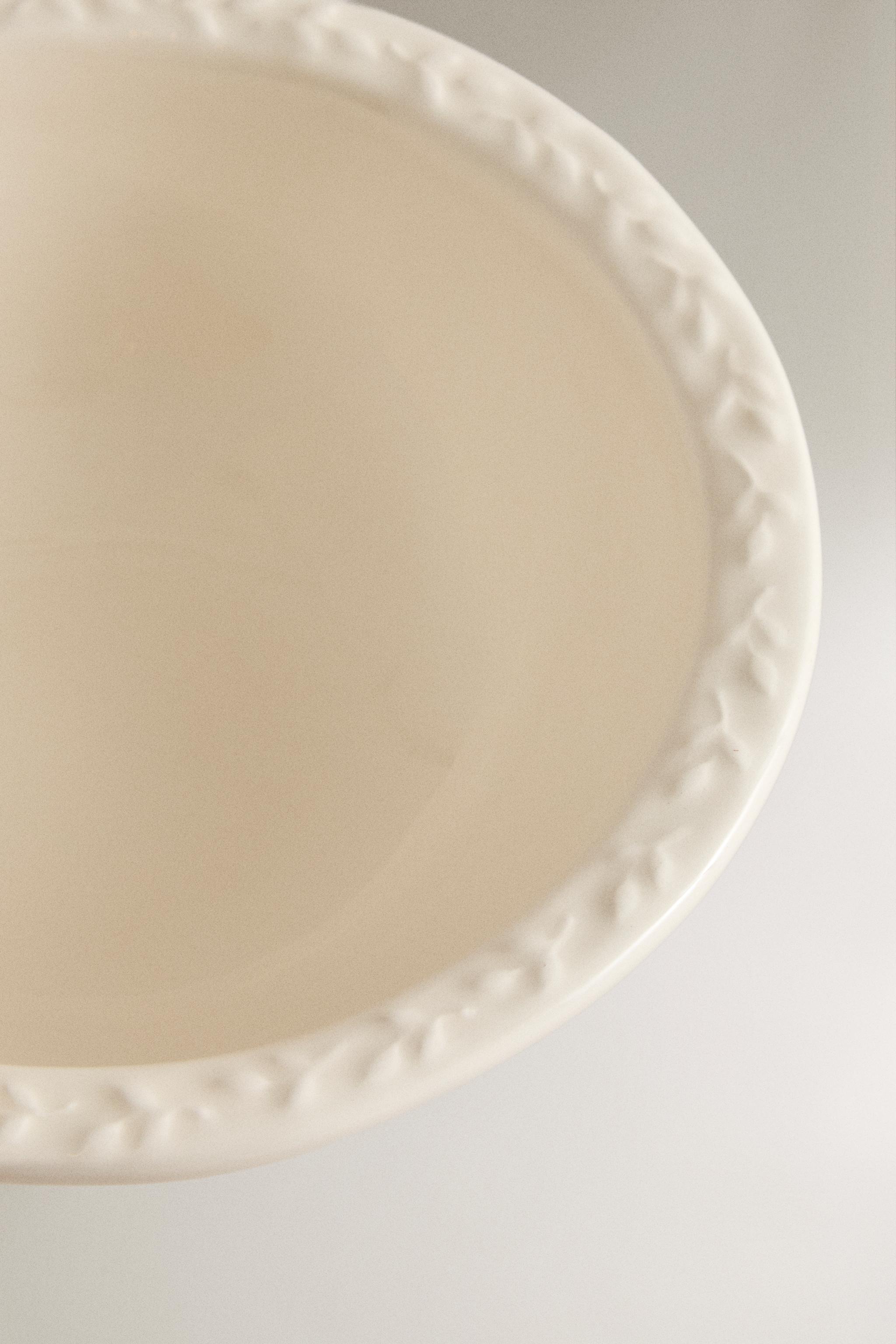 EARTHENWARE BOWL WITH RAISED RIM
